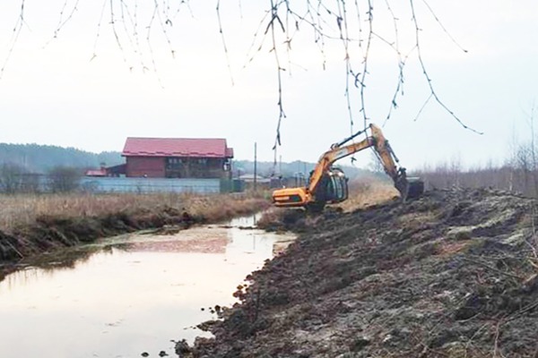Excavator During The Work